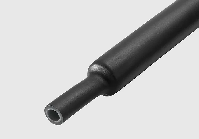 Tubo termocontraíble con pegamento